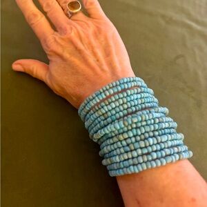 Turquoise spiral coil African inspired stretch bracelet. 15 strand  3” approx